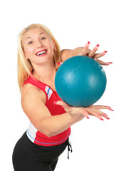 Sport blond makes exercise with ball