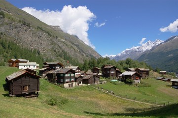 Fototapeta na wymiar swiss landscape with village in mountains