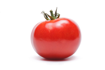 One tomato isolated against white background