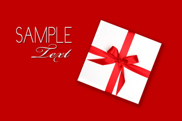 Perfectly Wrapped Holiday Gift With Red Ribbon and Bow