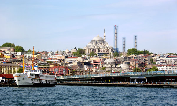 Mosque, bridge and a boat from historical Istanbul