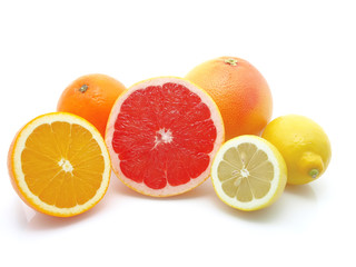 orange, lemon and grapefruit on white background
