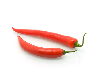 two  Pod of red peppers on white background
