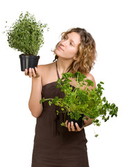 Young woman with culinary plants