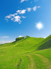 Obraz premium Summer Landscape. hill and sky