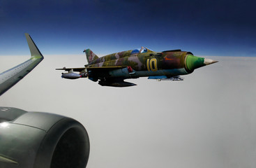 Fototapeta Passenger airplane and fighter obraz