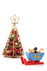 Sledge by the christmas tree