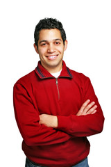 Happy young man crossing arms