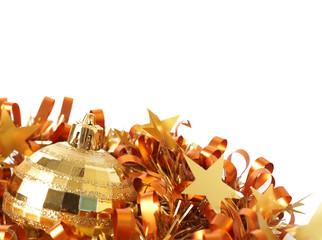 Gold Christmas bauble on tinsel