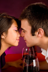 Couple Getting Closer While Having Wine