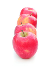 row of red apples