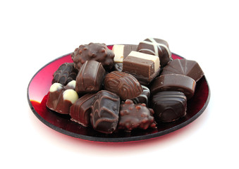 chocolates on a red dish