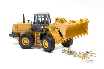 The heavy building bulldozer of yellow color