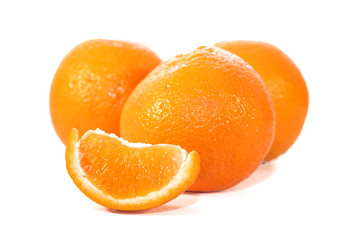 Naklejka na ściany i meble Oranges isolated on white background