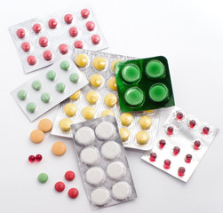 Pills and tablets isolated on white background