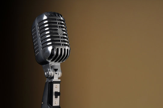 Vintage Microphone over Gradient Background