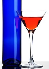 Glass with red liquid