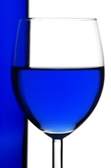 Glass with blue liquid
