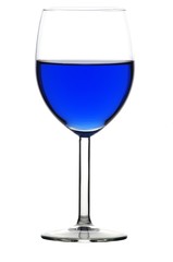Wineglass of blue liquid