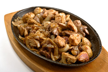 Chicken offal - hearts, a liver, mushrooms fried with spices