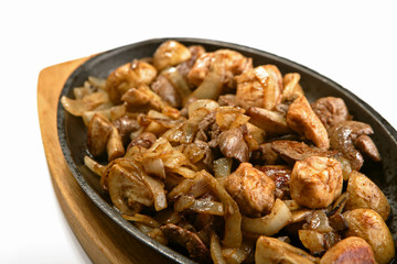 Chicken offal - hearts, a liver, mushrooms fried with spices