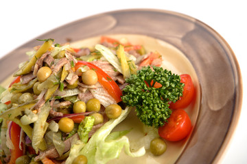 Farmer - salad from a beef tongue, fresh vegetables, gherkins wi