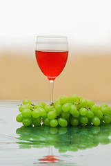 Red wine with grapes