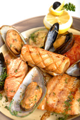 Sea allsorts - mussels, squids, a salmon, a pike perch with vege