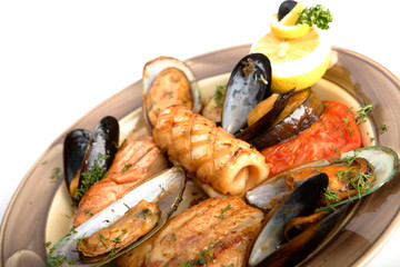 Sea allsorts - mussels, squids, a salmon, a pike perch with vege