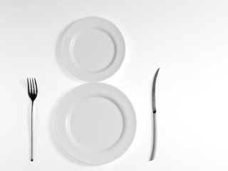 White plate on white background with knife  and fork.