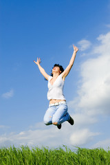 pretty young woman is jumping