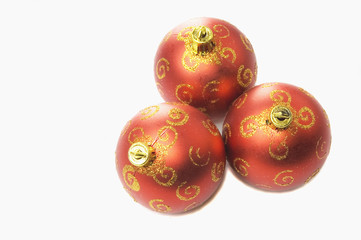 Three red christmas balls