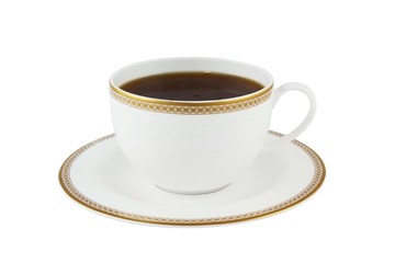 White cup of strong tea on white background