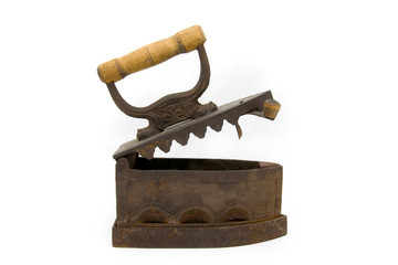 Old big rusty  iron isolated on white background