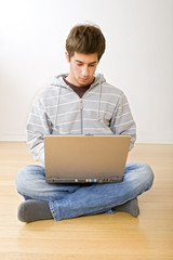 teenager and laptop computer