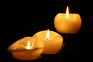 Three candles burning