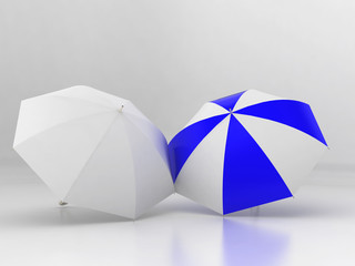 two umbrellas on white background