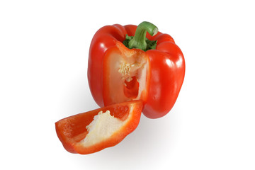 Isolated red sweet pepper standing on white background