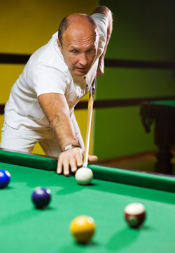 Man playing billiards