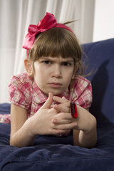 Angry little girl isolate on white