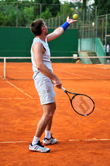 Fototapeta na wymiar One man play tennis outdoors