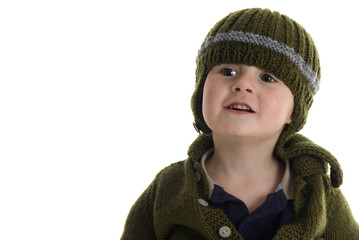 toddler wearing sweater and hat