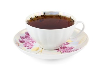 White cup of strong tea on white