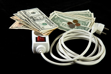 power plug and money concept energy costs