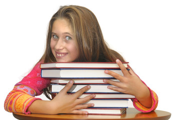 Beautiful young girl posing with books