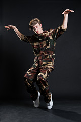 breakdancer in military uniform