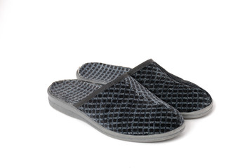Two slippers on a white