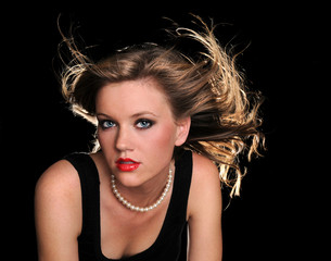 Beautiful Woman With Hair Blowing