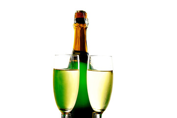 Champagne glasses and bottle on white background