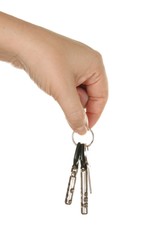 human hand with keys on white  background